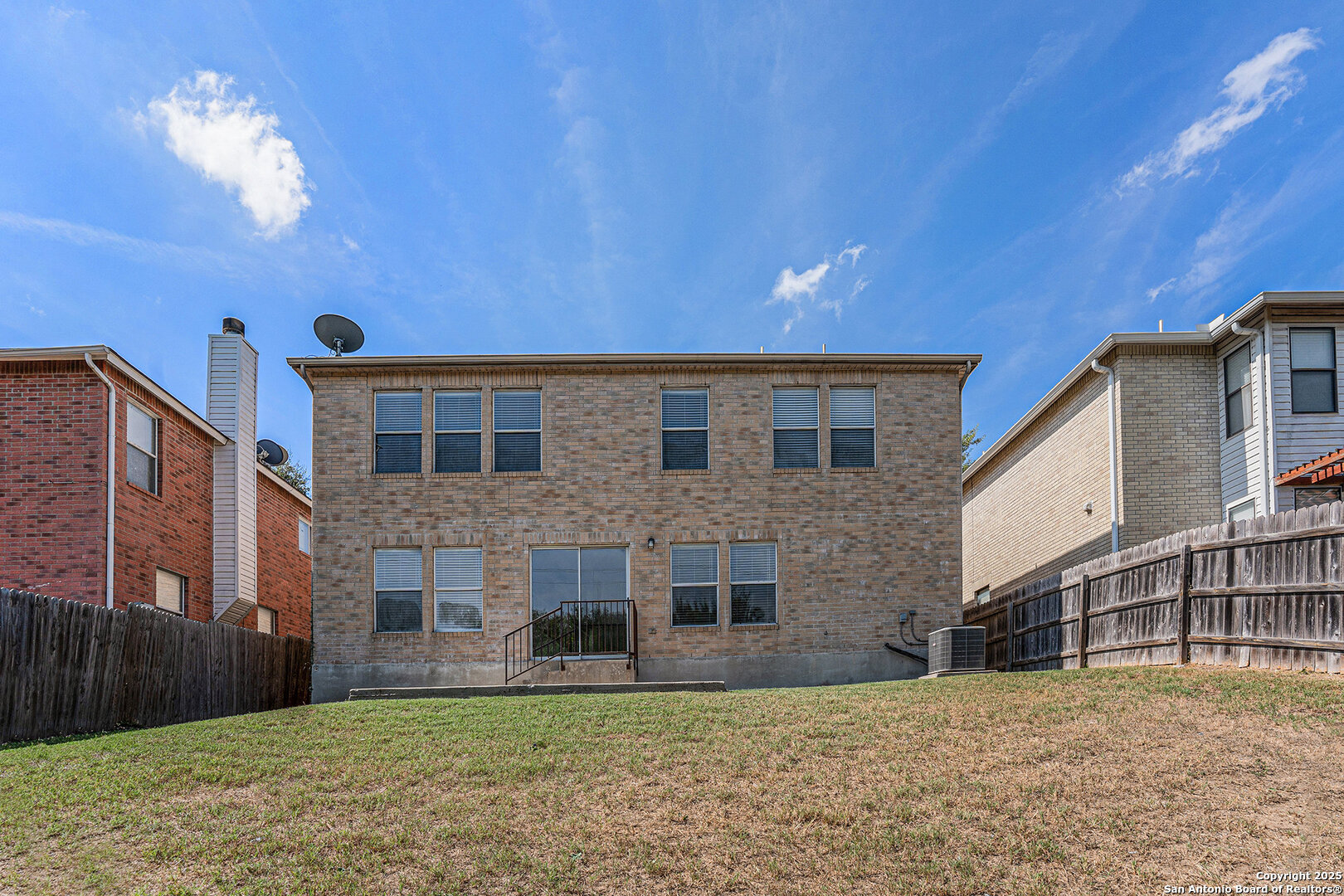 8447 Mannington Place Converse, TX 78109 - Photo 26 of 26 a view of a house with a yard