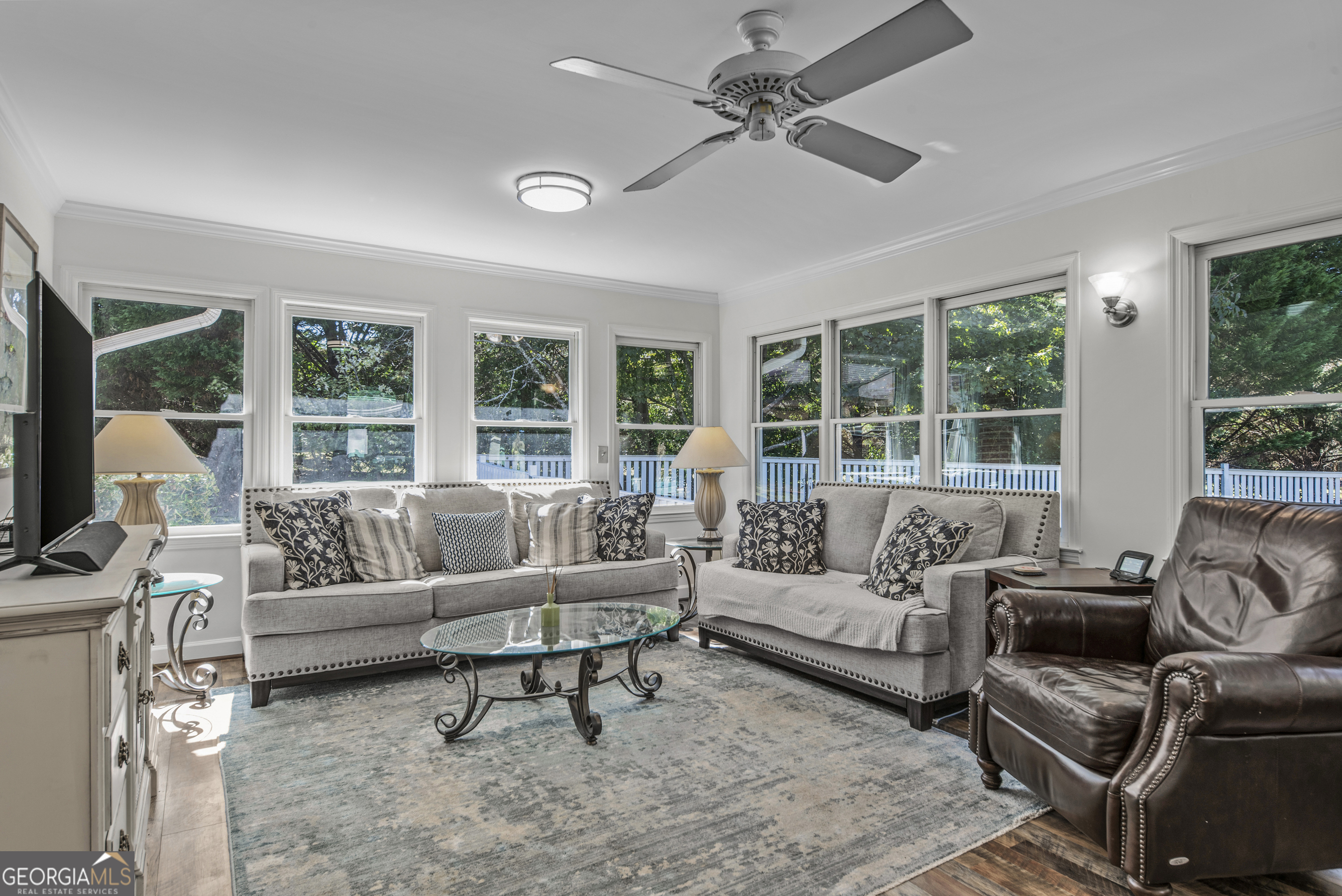 991 Old Post Road Madison, GA 30650 - Photo 22 of 61 a living room with furniture and a large window