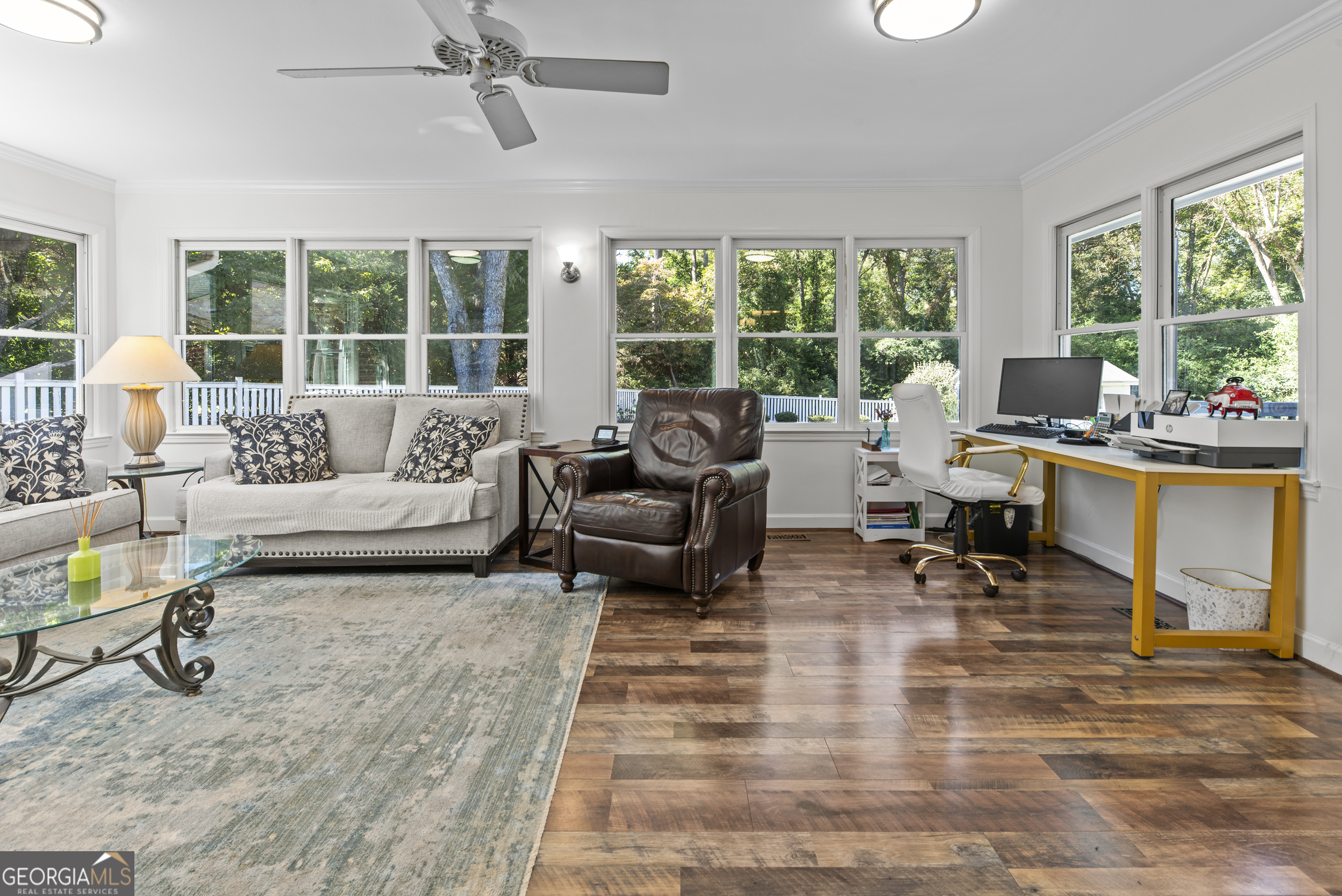 991 Old Post Road Madison, GA 30650 - Photo 24 of 61 a living room with furniture and a large window