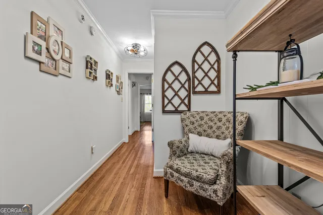 a bedroom with a bed and a night stand