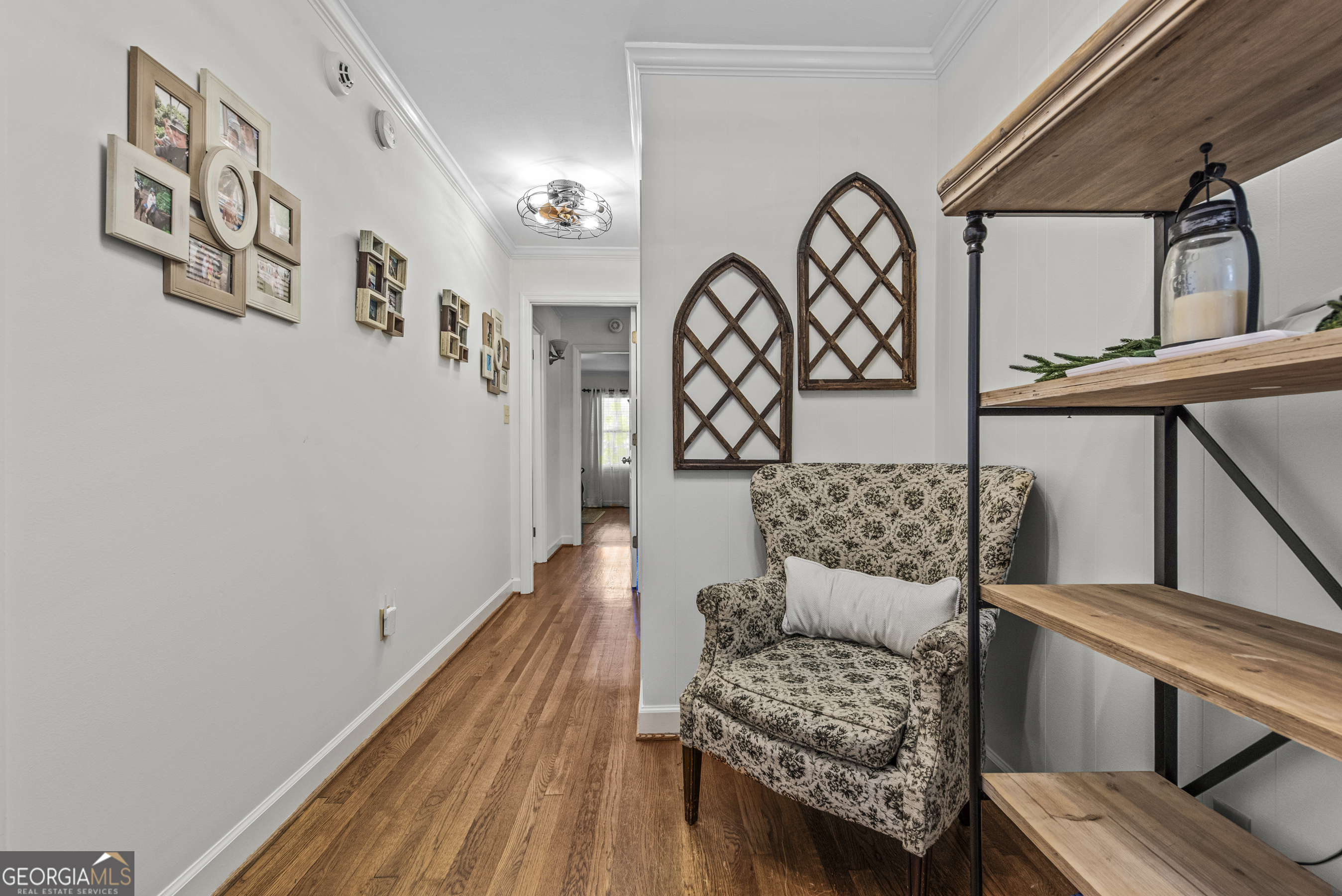 991 Old Post Road Madison, GA 30650 - Photo 27 of 61 a living room with furniture and a wooden floor
