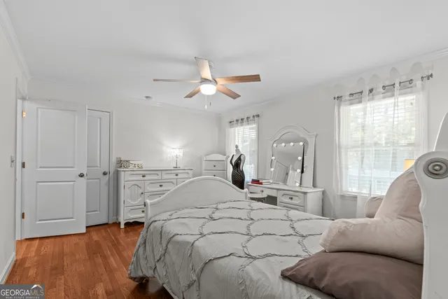a bathroom with a tub sink and window