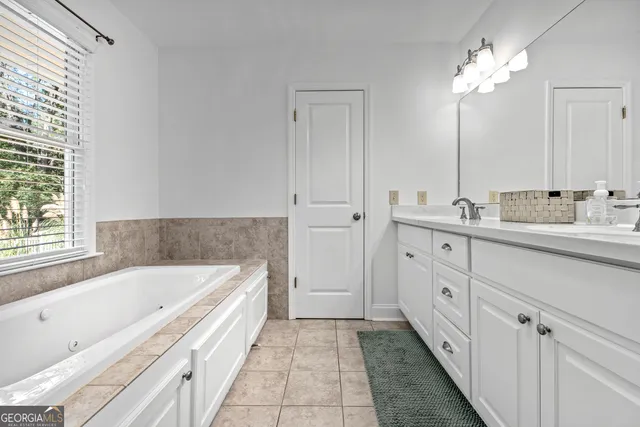 a view of a hallway with washer and dryer