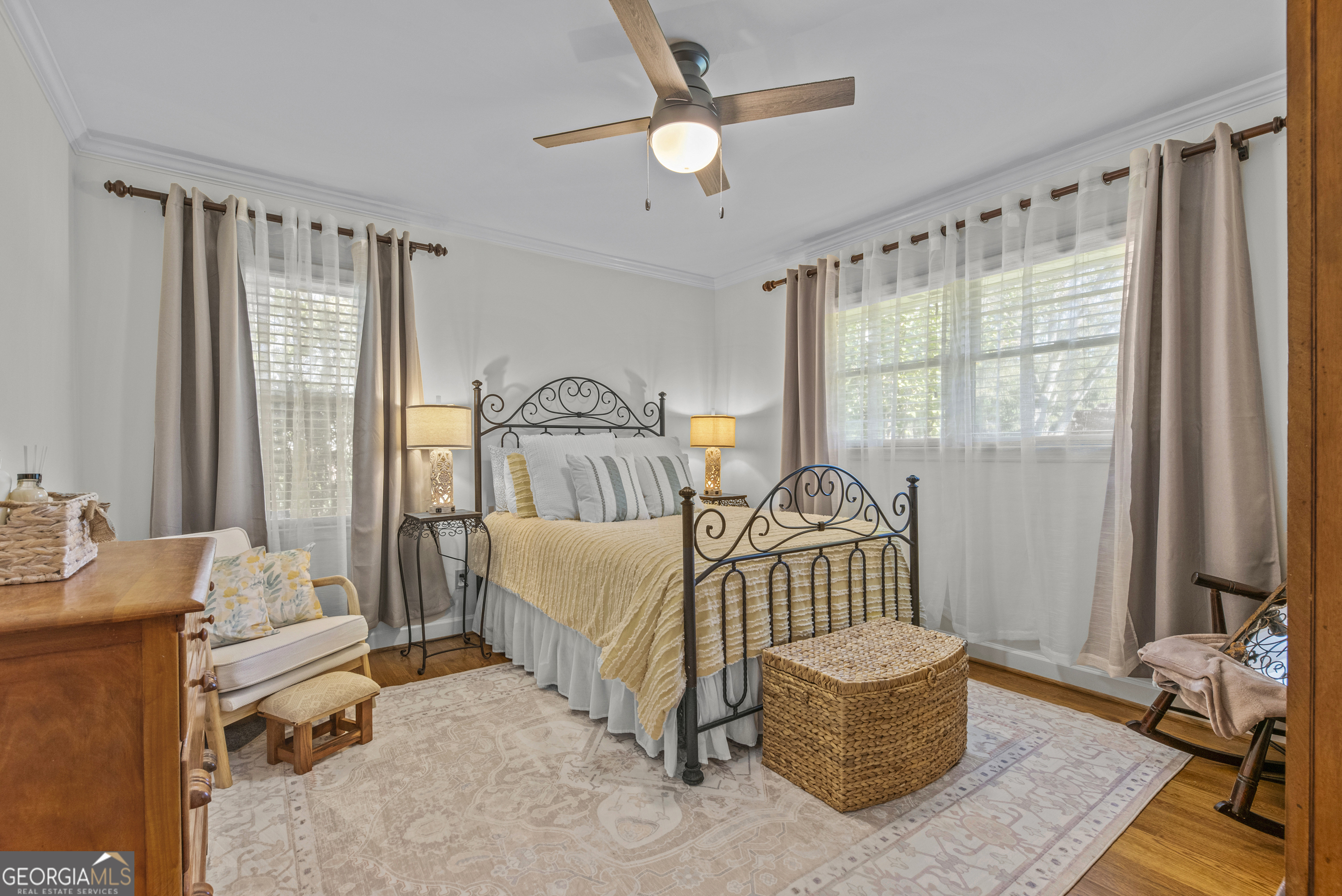 991 Old Post Road Madison, GA 30650 - Photo 41 of 61 a bedroom with a bed and a chandelier