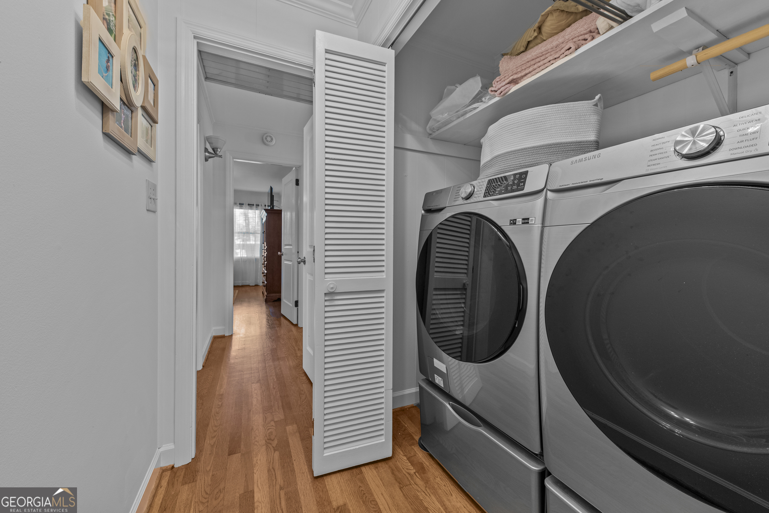 991 Old Post Road Madison, GA 30650 - Photo 43 of 61 a view of a hallway with washer and dryer