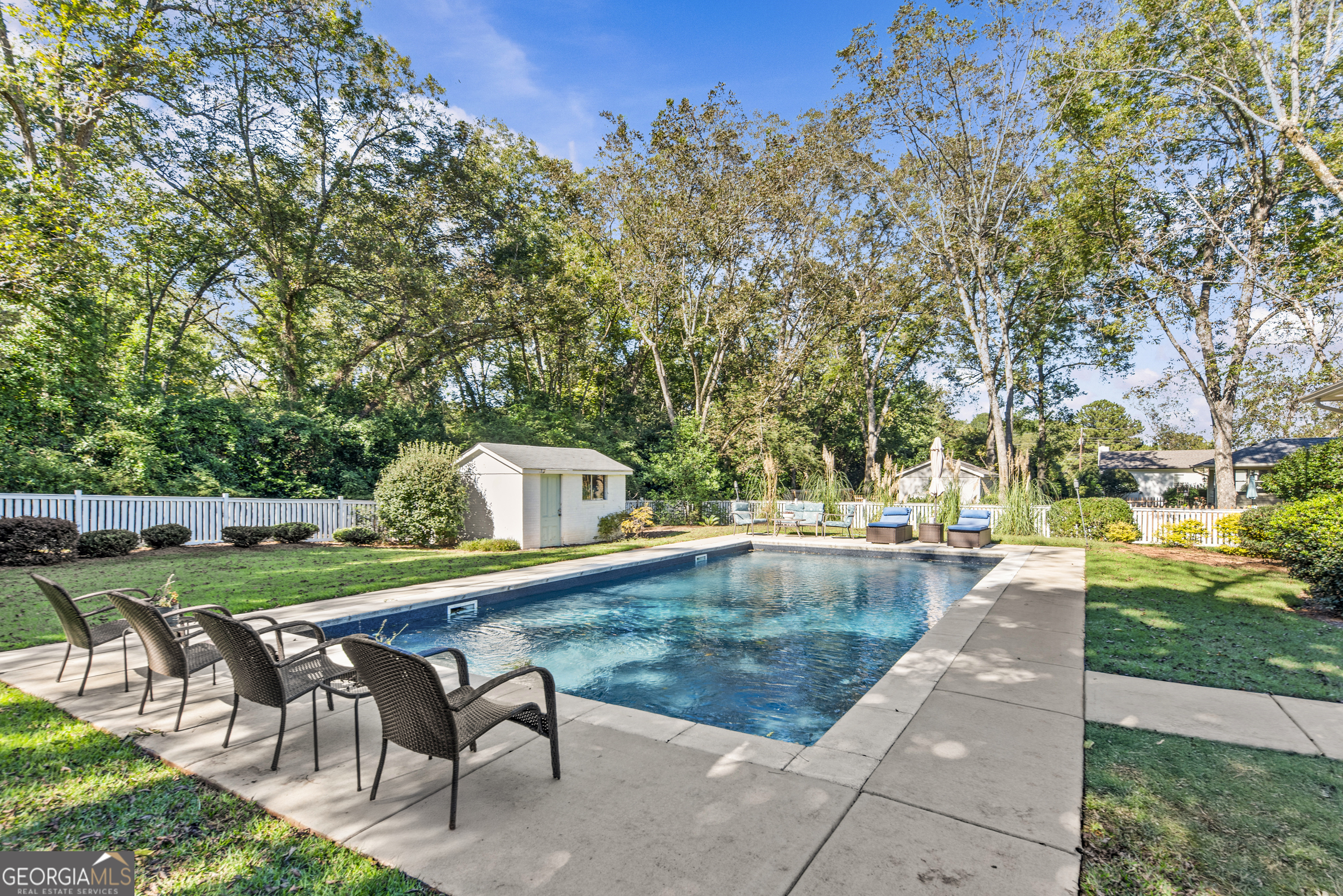 991 Old Post Road Madison, GA 30650 - Photo 45 of 61 a view of a backyard with sitting area