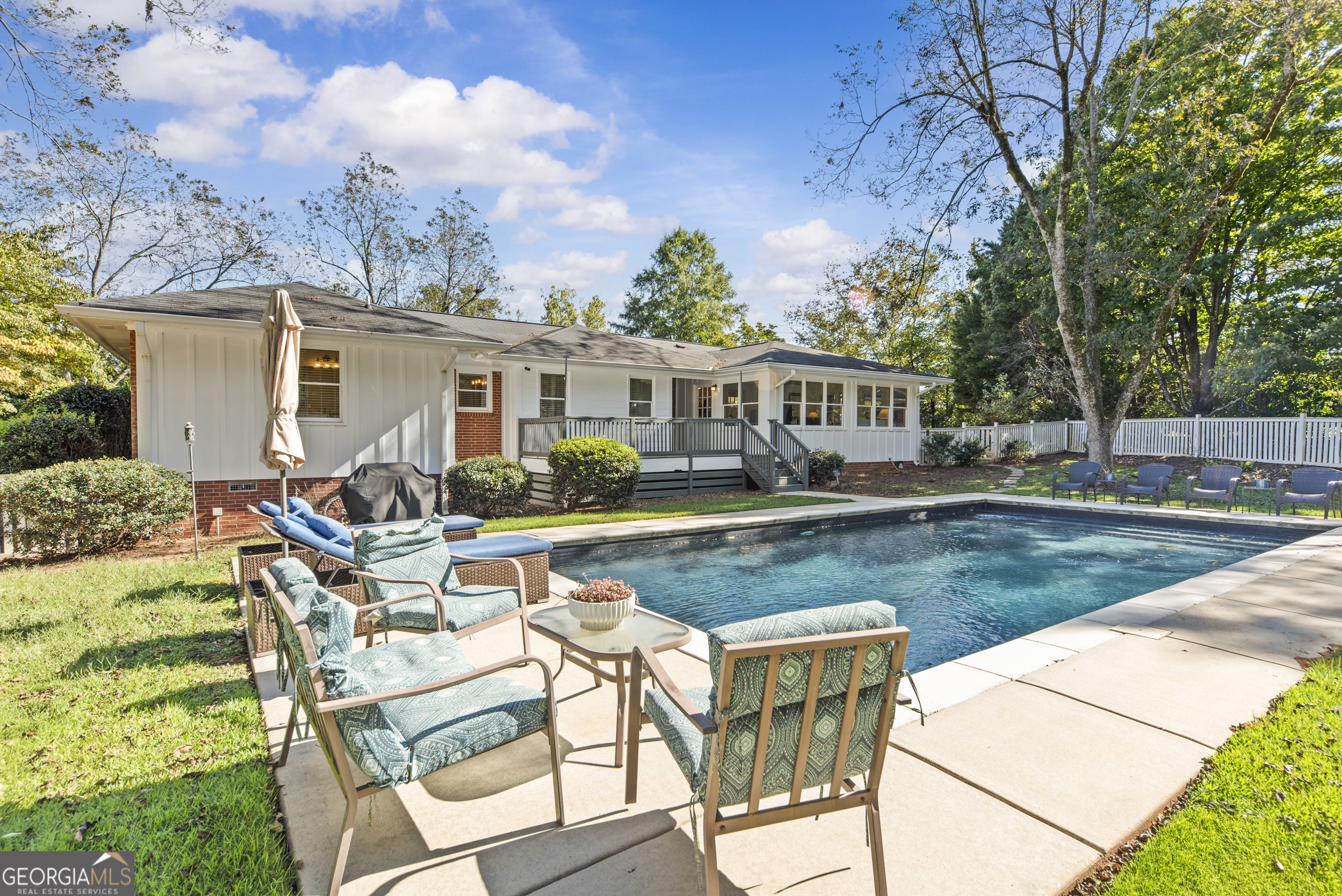 991 Old Post Road Madison, GA 30650 - Photo 47 of 61 a view of a house with backyard porch and sitting area