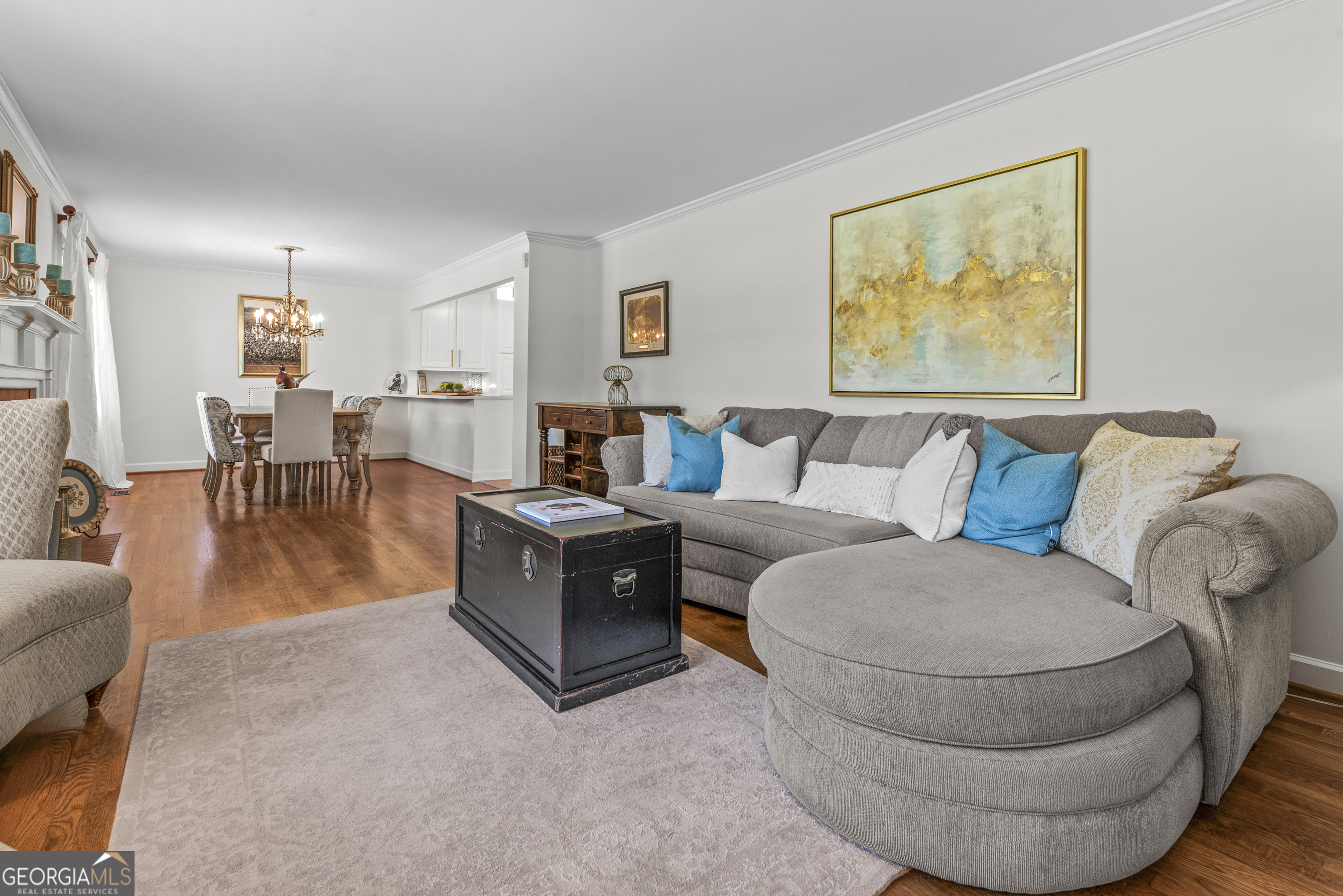 991 Old Post Road Madison, GA 30650 - Photo 7 of 61 a living room with furniture and a wooden floor