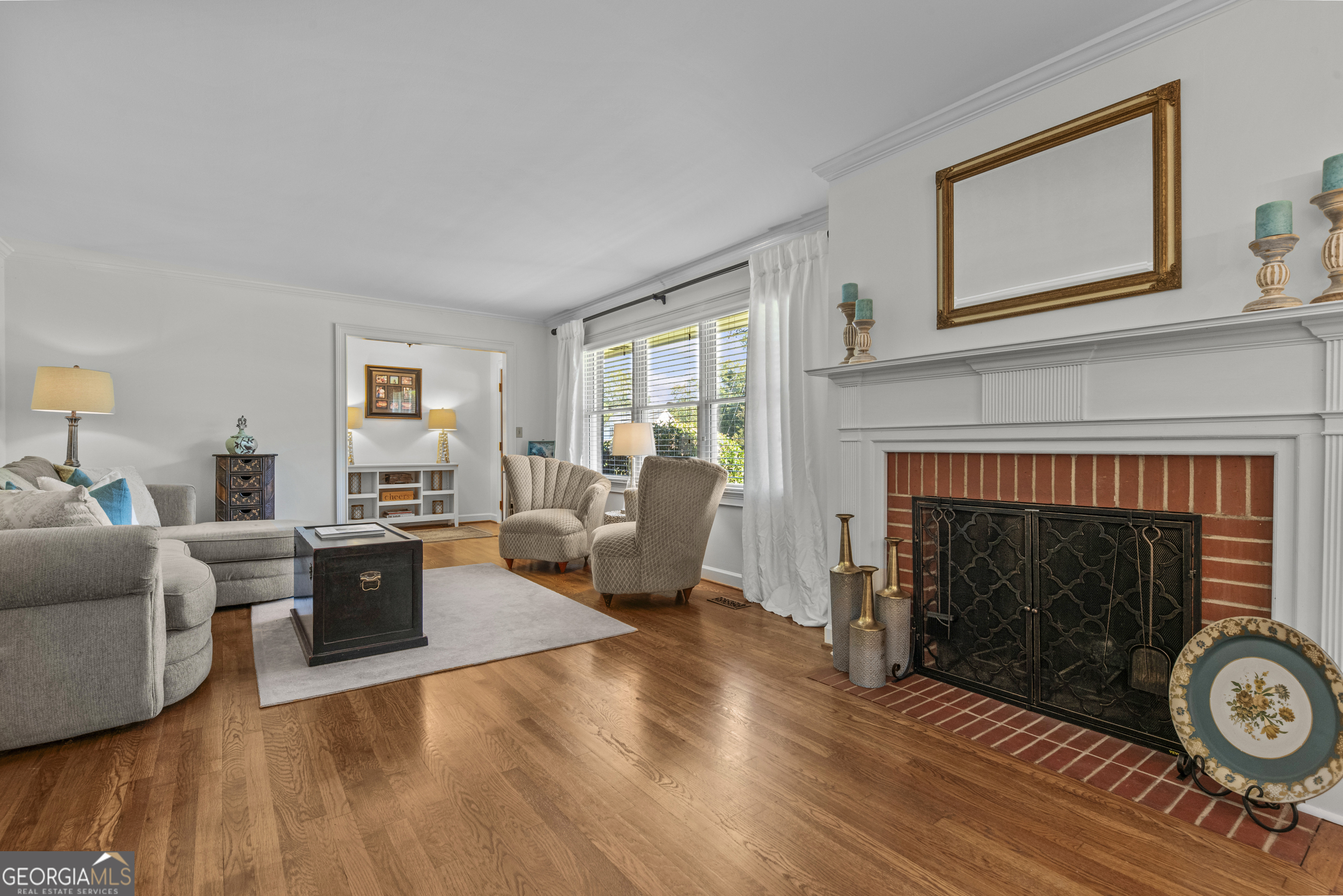 991 Old Post Road Madison, GA 30650 - Photo 8 of 61 a living room with furniture and a fireplace