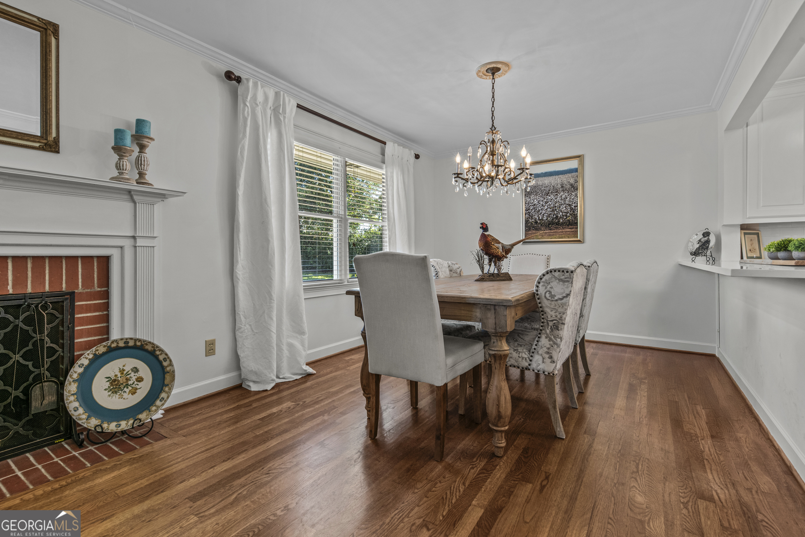 991 Old Post Road Madison, GA 30650 - Photo 10 of 61 a view of a dining room with furniture window and wooden floor
