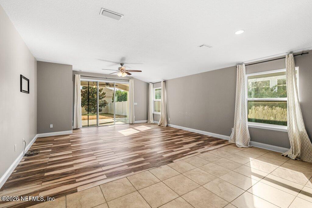 14042 Carson Court Jacksonville, FL 32224 - Photo 14 of 37 a view of an empty room with a window