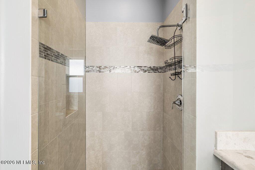 14042 Carson Court Jacksonville, FL 32224 - Photo 24 of 37 a bathroom with a shower