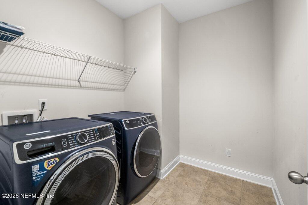 14042 Carson Court Jacksonville, FL 32224 - Photo 29 of 37 a utility room with dryer and washer