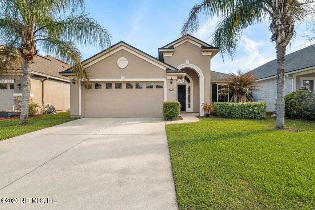 14042 Carson Court Jacksonville, FL 32224 - Photo 3 of 37 a front view of house with yard and green space