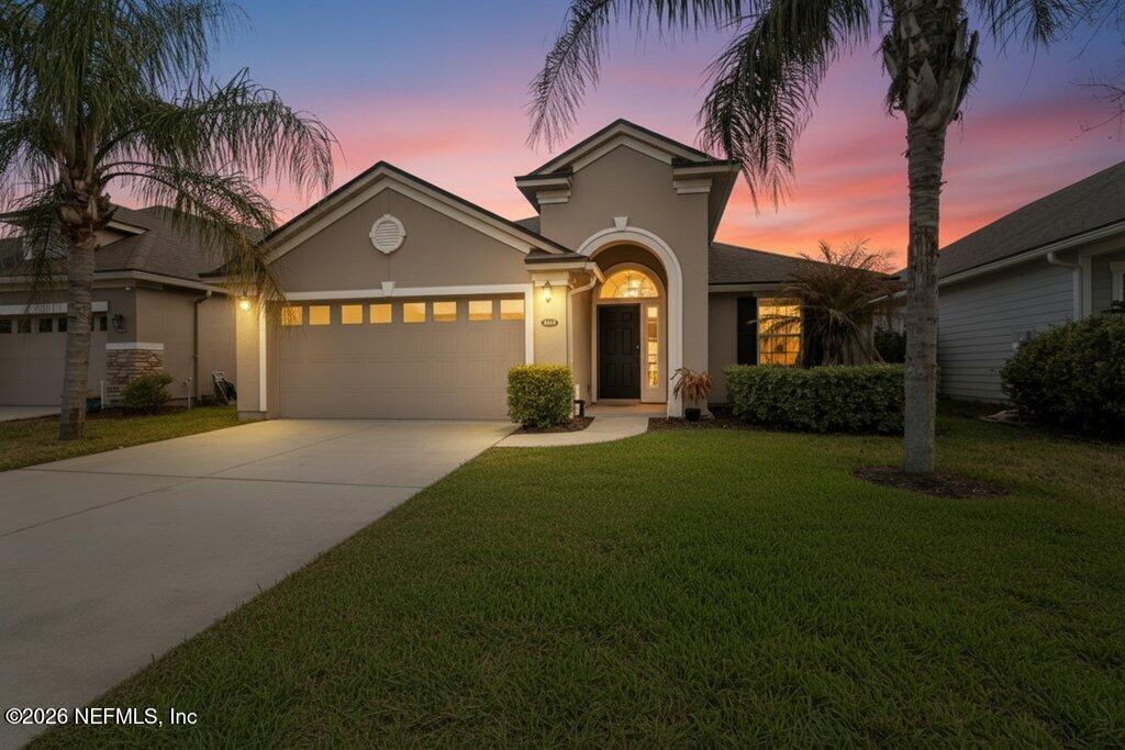 14042 Carson Court Jacksonville, FL 32224 - Photo 4 of 37 a front view of a house with garden