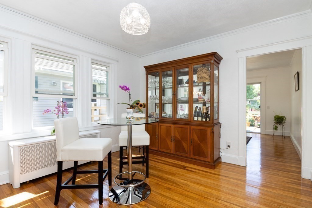 16 Libbey Street Boston, MA 02132 - Photo 18 of 41 a view of a dining room with furniture and wooden floor
