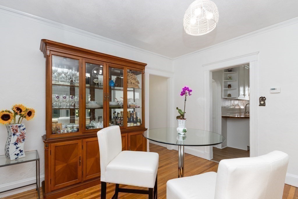 16 Libbey Street Boston, MA 02132 - Photo 21 of 41 a dining room with furniture and wooden floor