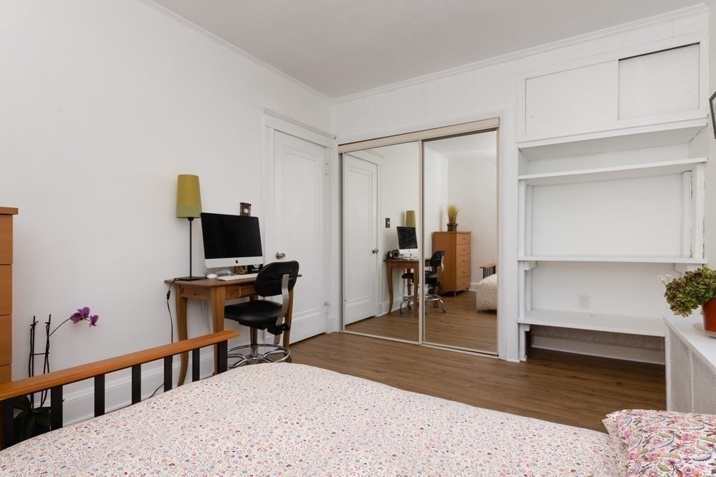 16 Libbey Street Boston, MA 02132 - Photo 23 of 41 a view of a livingroom with furniture and a flat screen tv