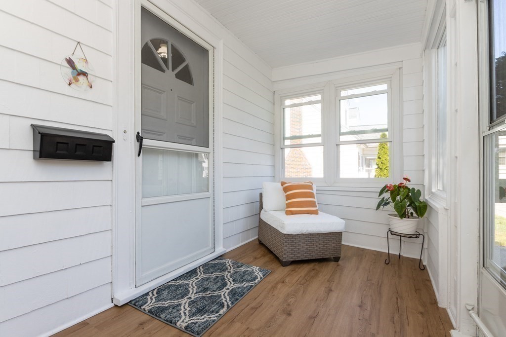 16 Libbey Street Boston, MA 02132 - Photo 3 of 41 a living room with furniture and flowers