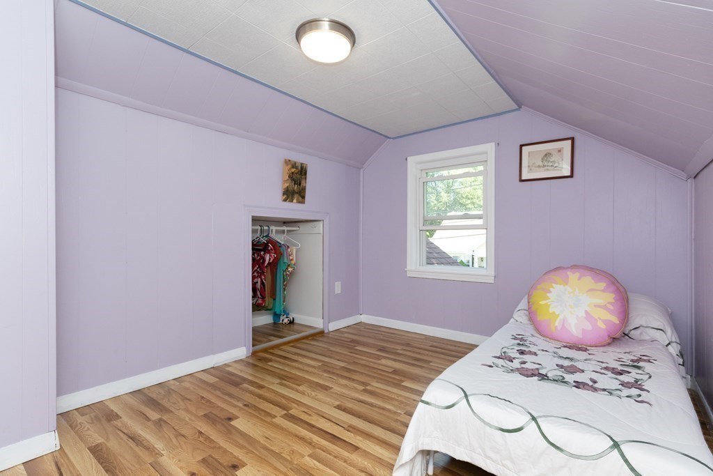 16 Libbey Street Boston, MA 02132 - Photo 33 of 41 a bedroom with bed and a window