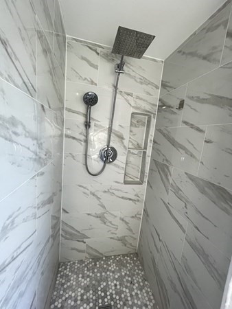 16 Libbey Street Boston, MA 02132 - Photo 41 of 41 a bathroom with a shower