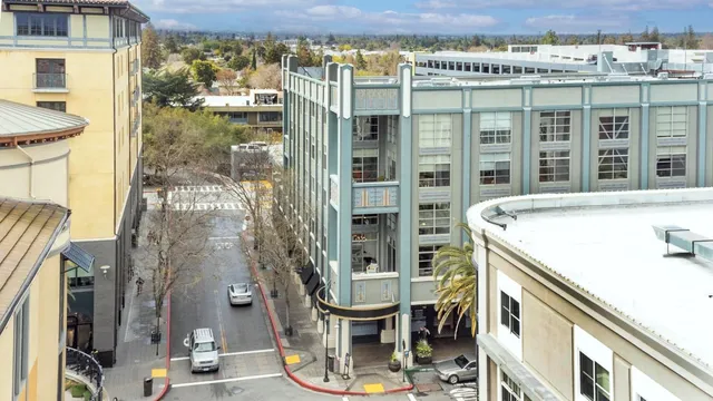 a view of building with outdoor seating
