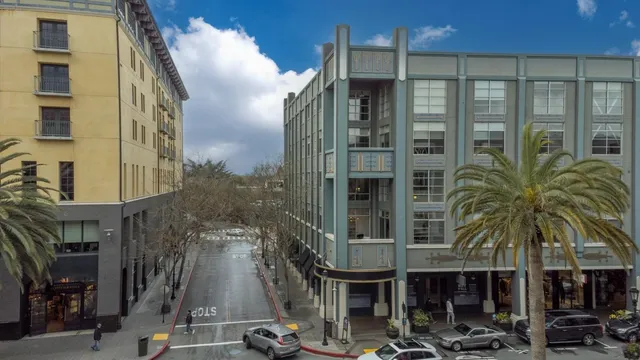 a city street with tall buildings
