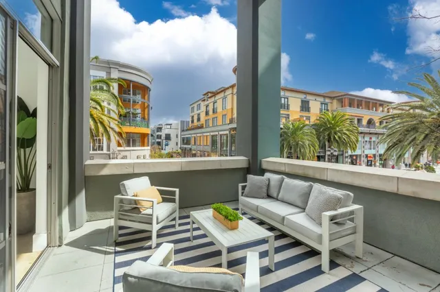 a building outdoor space with patio furniture