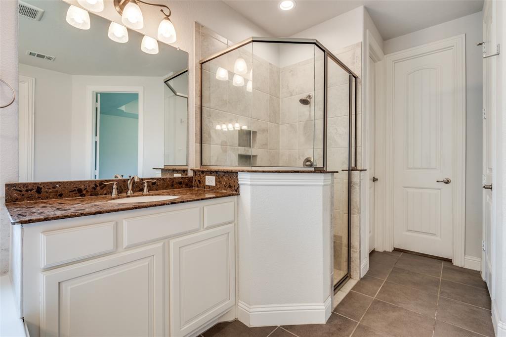 426 Summer Grove Drive Midlothian, TX 76065 - Photo 15 of 25 a bathroom with a granite countertop sink and a mirror