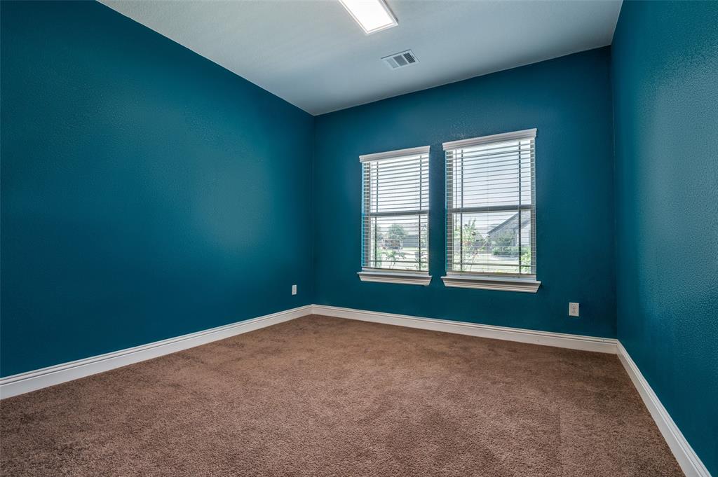 426 Summer Grove Drive Midlothian, TX 76065 - Photo 16 of 25 an empty room with windows