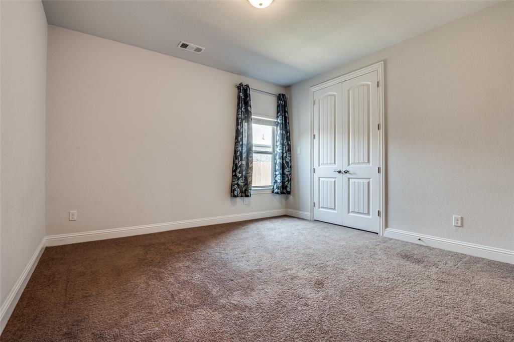 426 Summer Grove Drive Midlothian, TX 76065 - Photo 17 of 25 an empty room with windows