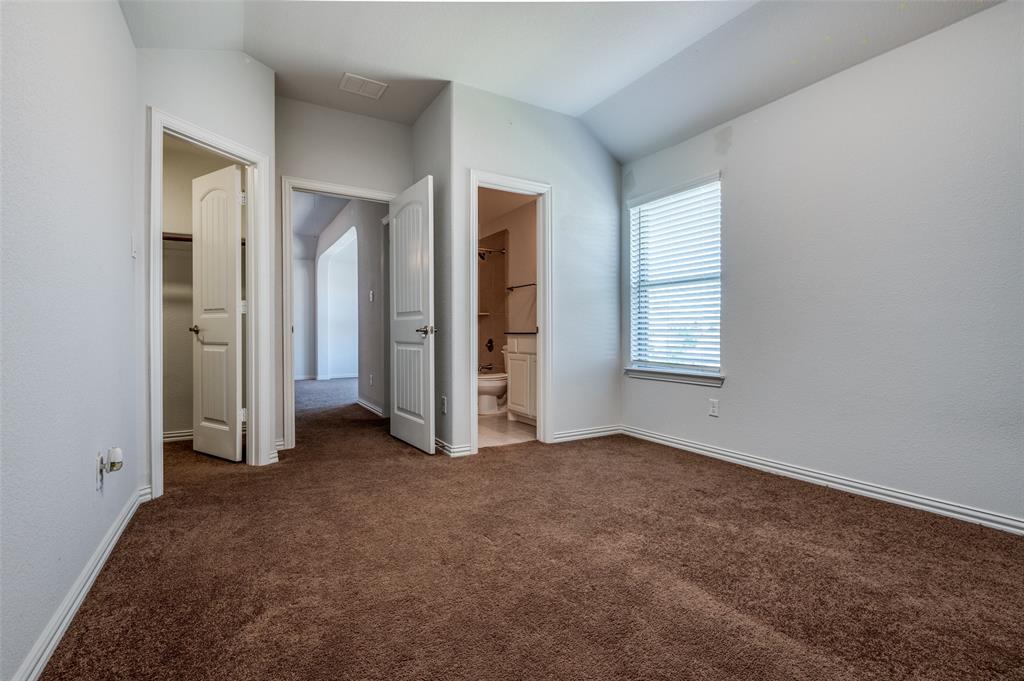 426 Summer Grove Drive Midlothian, TX 76065 - Photo 21 of 25 an empty room with windows and closet