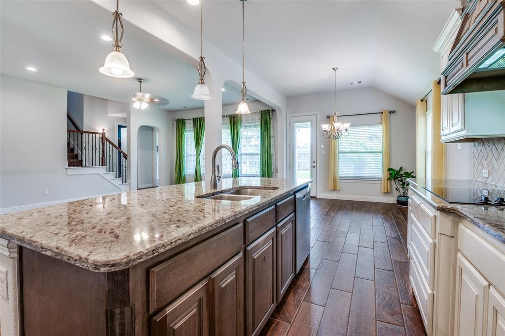 426 Summer Grove Drive Midlothian, TX 76065 - Photo 9 of 25 a kitchen with granite countertop a sink and counter space