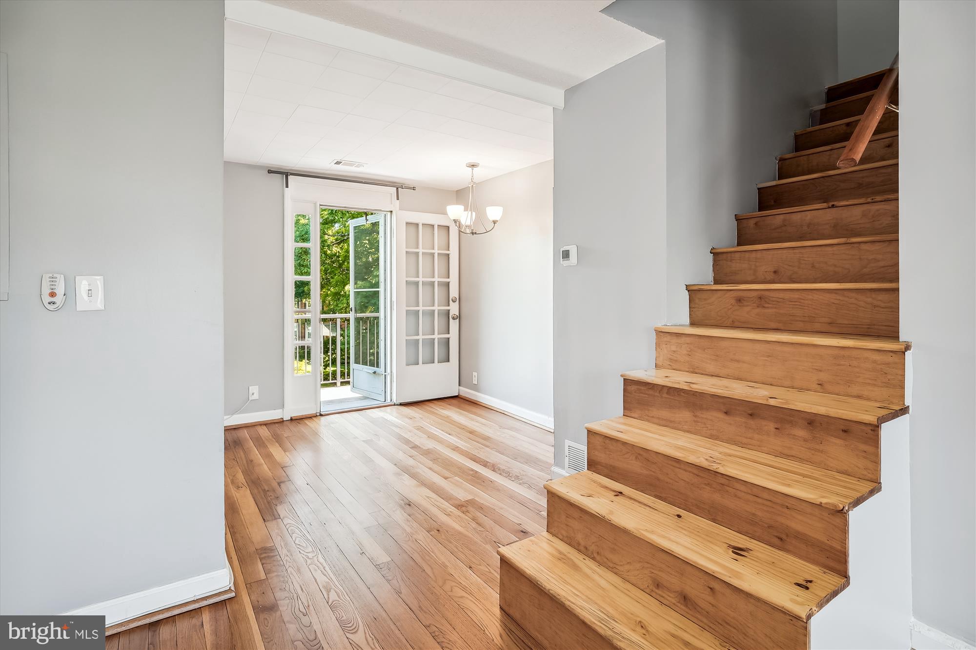 4860 28th Street South, Unit C2 Arlington, VA 22206 - Photo 5 of 34 Stairs leading to loft; dining room in background