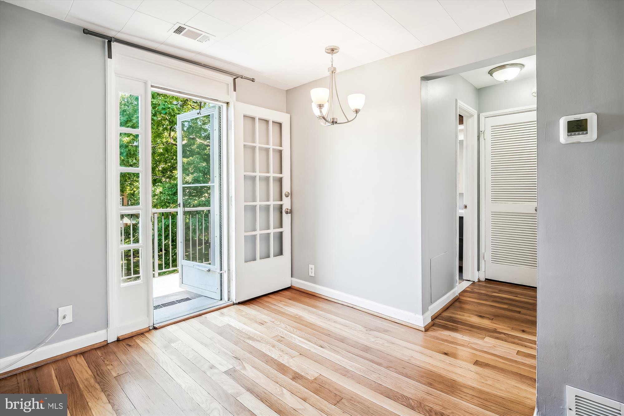 4860 28th Street South, Unit C2 Arlington, VA 22206 - Photo 6 of 34 Dining room and balcony with view