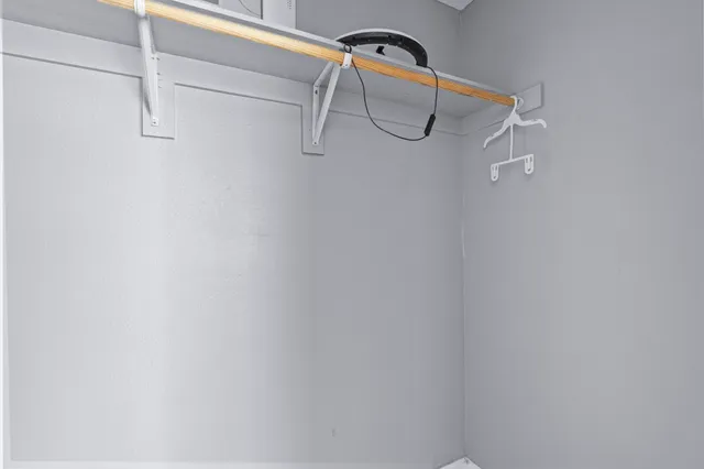 a view of a room with racks on the wall