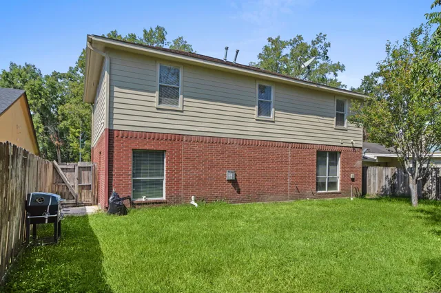 a backyard of a house with lots of green space