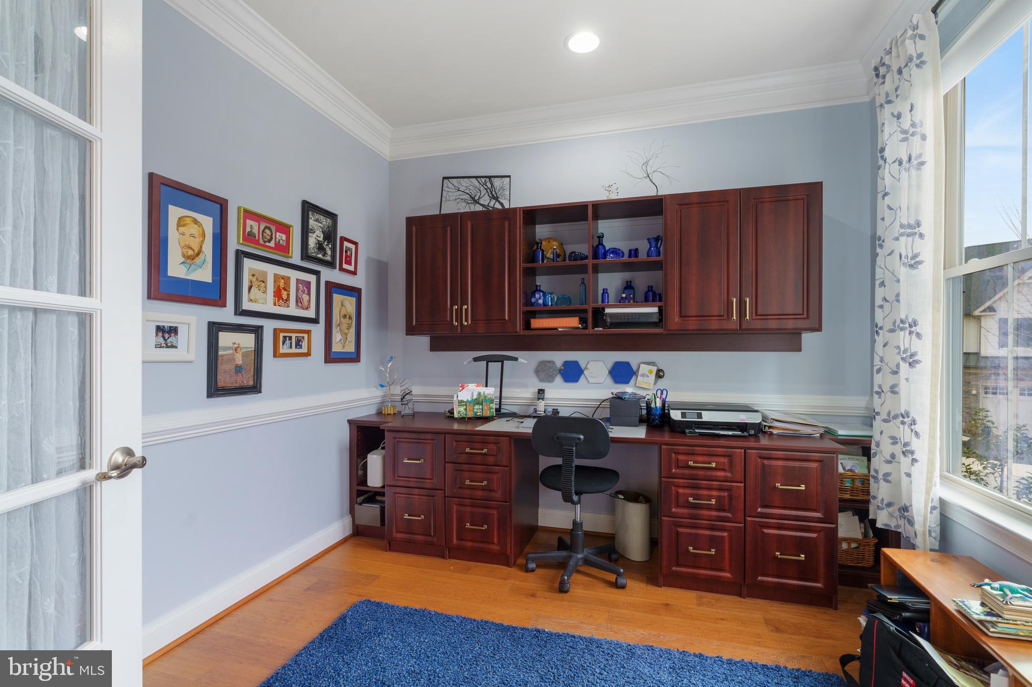 6926 Summit Circle Baltimore, MD 21239 - Photo 9 of 52 a view of a workspace with furniture and cabinet