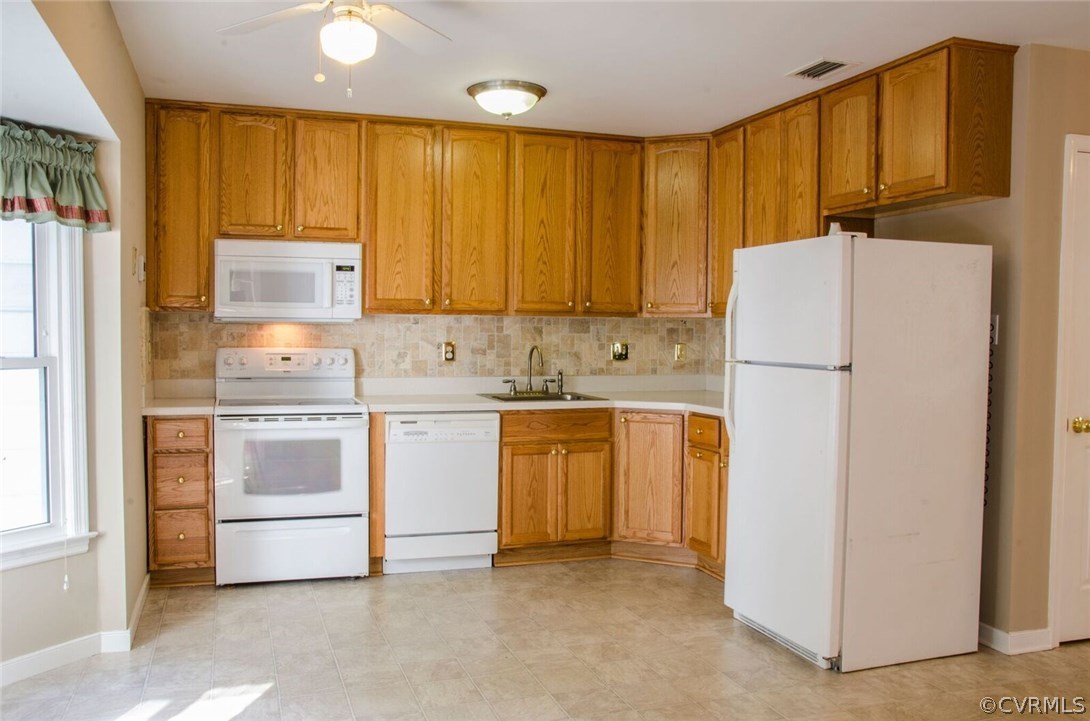 8637 Pleasant Ridge Road North Chesterfield, VA 23237 - Photo 5 of 23 Eat in Kitchen with Corian counter tops & 42" cust