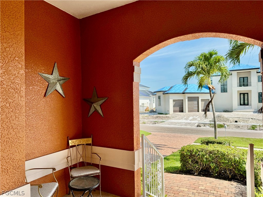 1740 Ludlow Road Marco Island, FL 34145 - Photo 3 of 47 a view of a house with backyard and sitting area