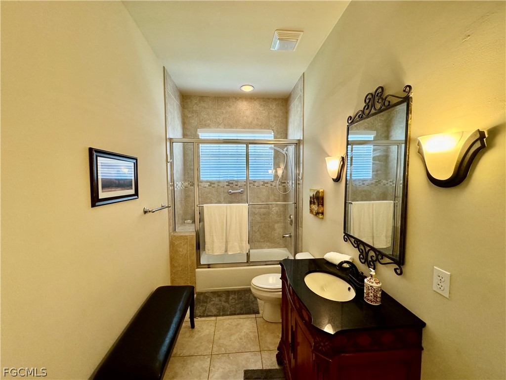 1740 Ludlow Road Marco Island, FL 34145 - Photo 36 of 47 a bathroom with a sink mirror and tub