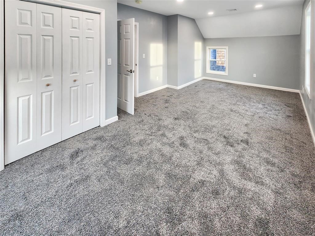 144 Rounds Street New Bedford, MA 02740 - Photo 13 of 20 a view of an empty room and window