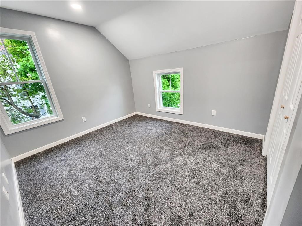 144 Rounds Street New Bedford, MA 02740 - Photo 16 of 20 an empty room with a window