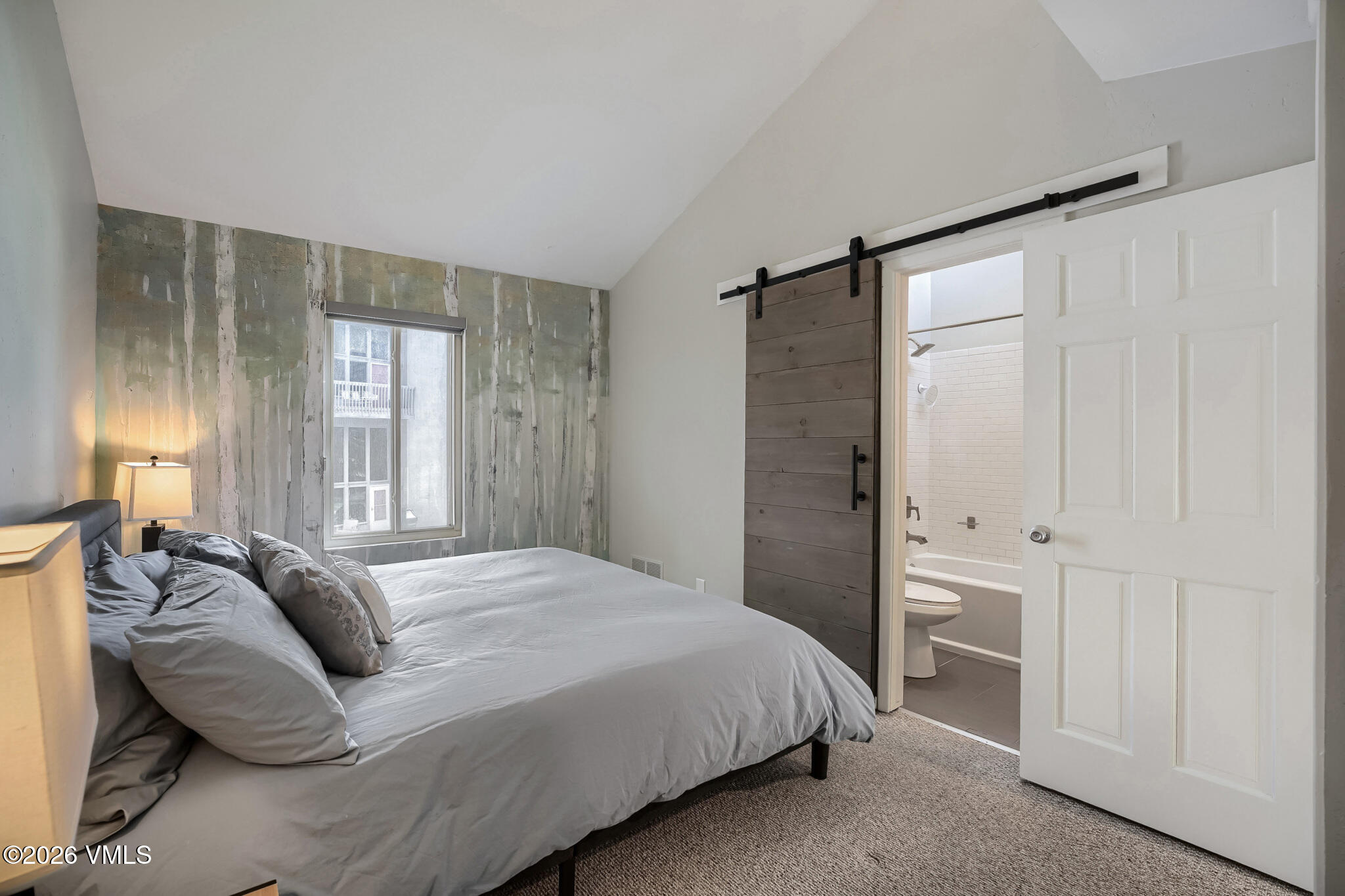 142 Eagle Drive, Unit C1 Avon, CO 81620 - Photo 12 of 20 a bedroom with a bed and a window