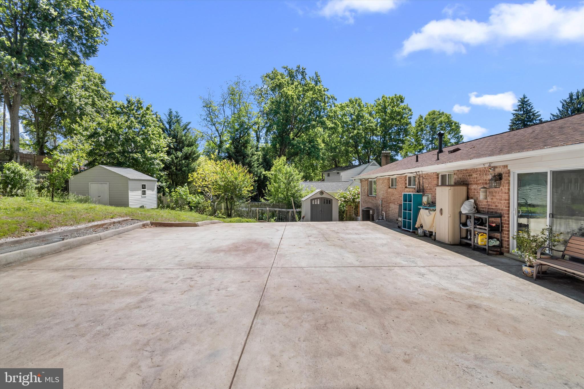 8304 Harland Drive Springfield, VA 22152 - Photo 35 of 39 a front view of a house with a yard and garage