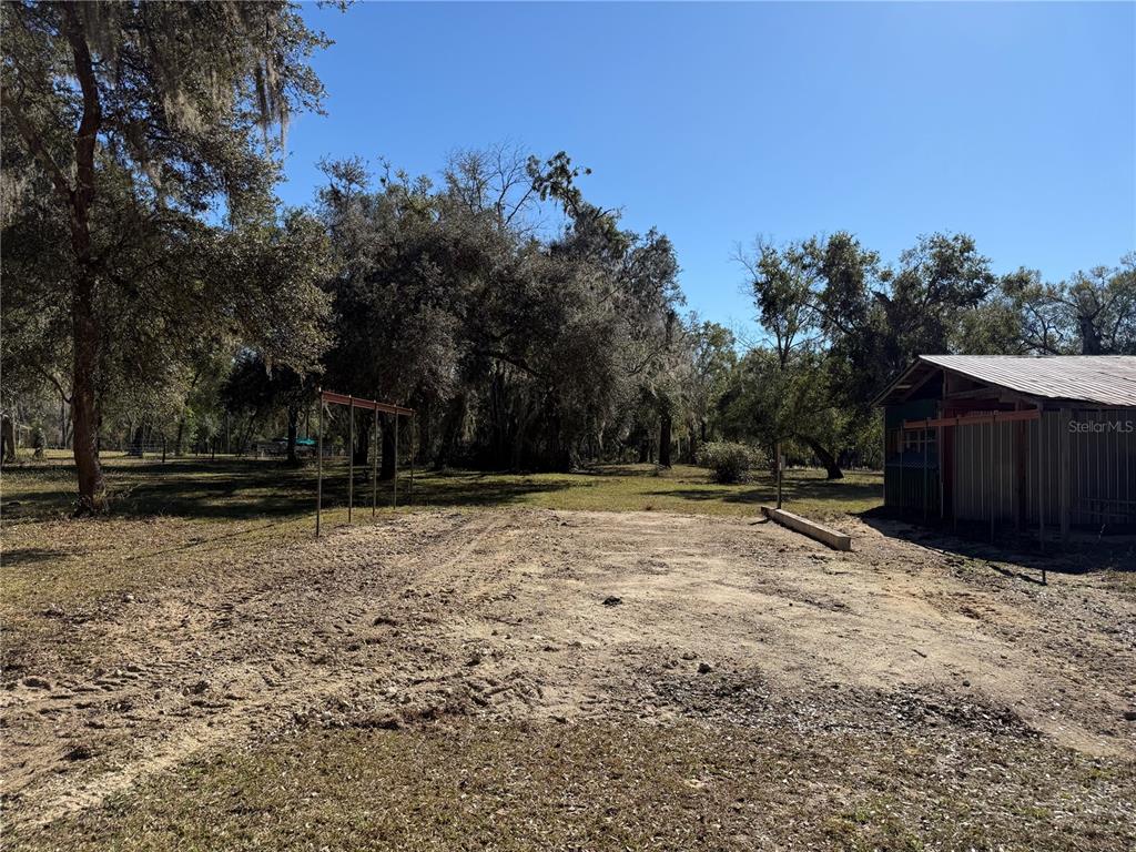 18630 Bradshaw Road Dade City, FL 33523 - Photo 7 of 43 a view of backyard with green space