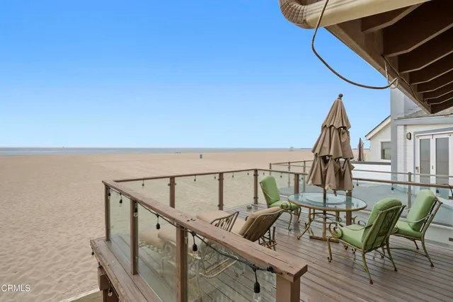 a view of balcony with furniture