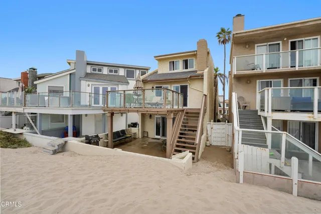 a front view of a building with parking