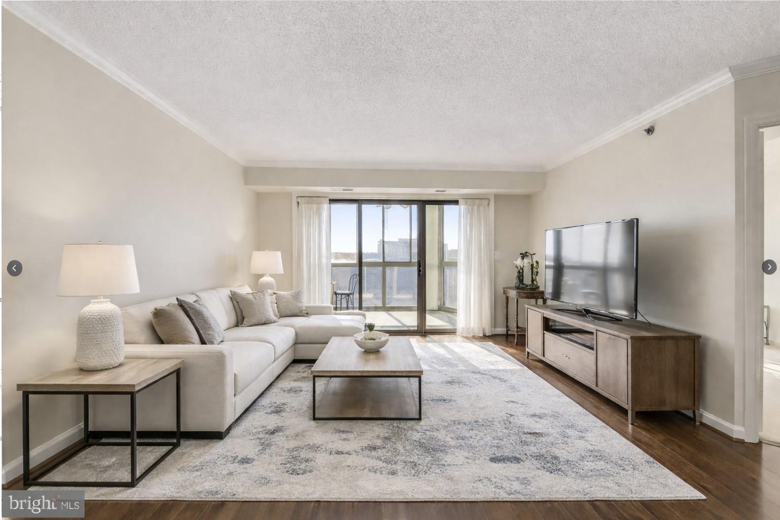 19385 Cypress Ridge Terrace, Unit 920 Leesburg, VA 20176 - Photo 2 of 40 Virtually Staged Living Room.