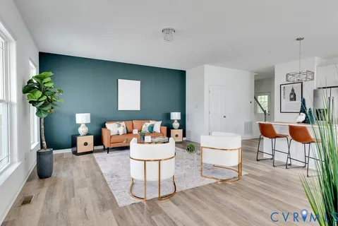 a living room with furniture and a table